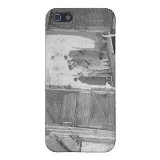 Townspeople View Damage After Storm Along iPhone 5 Covers