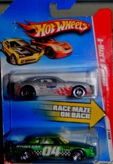 Hot Wheels A Maze'N Speedway 2 Pack INDIANAPOLIS 500 chevy camaro & metallic green pontiac stunt car: Toys & Games