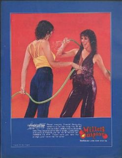 Chemin de fer designer jeans Miller Outposts ad 1979 girls hosing each other: Entertainment Collectibles