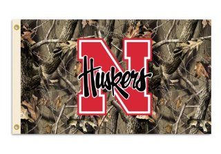 NCAA Nebraska Cornhuskers 3 by 5 Foot Flag with Grommets   Realtree Camo Background : Outdoor Banners : Sports & Outdoors