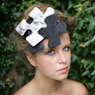puzzled leather headdress by the headmistress