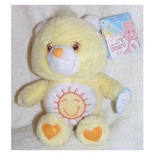 Care Bears Baby Singing Funshine Bear Sings "ABC Song" (Baby's First Care Bear): Toys & Games