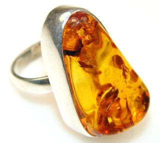 Amber Women's Silver Ring Size: 8 10.20g (color: brown, dim.: 1 1/4, 3/4, 1/2 inch). Amber Crafted in 925 Sterling Silver only ONE ring available   ring entirely handmade by the most gifted artisans   one of a kind world wide item   FREE GIFT BOX: Jewe