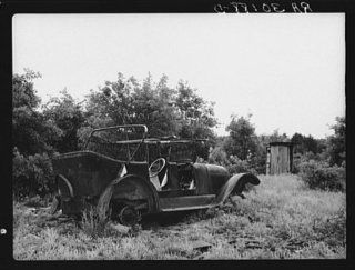 Photo: Old automobile, outhouse on Art Simplot's farm near Black River Falls, Wisconsin   Prints