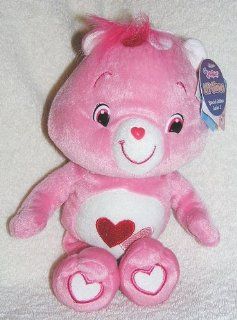 2007 The New Care Bears   Special Edition 10" Plush Lil' Glows Love A Lot Bear   Glow in the Dark Bear Toys & Games