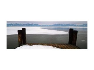 Frozen lake in front of snowcapped mountains, Chiemsee, Bavaria, Germany Poster Print by Panoramic Images (36 x 12)