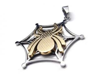 Stainless steel web pendant with gold colored spider